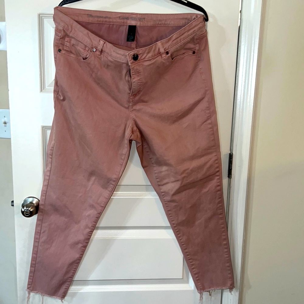 Gently used rose colored ankle skinny jeans from Land Bryant